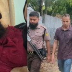 ফ্ল্যাট থেকে নারীসহ ওসি আটক